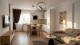 Zona de living și dining a unui apartament din Ozone Residence
